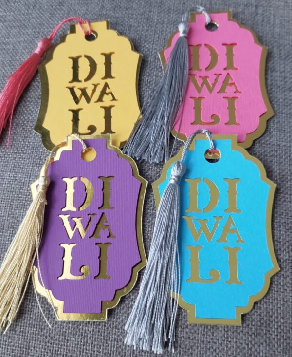 Four Diwali Tags in Purple, Blue, Yellow and Magenta