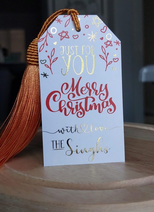 A personalised Christmas Tag from the Singhs.