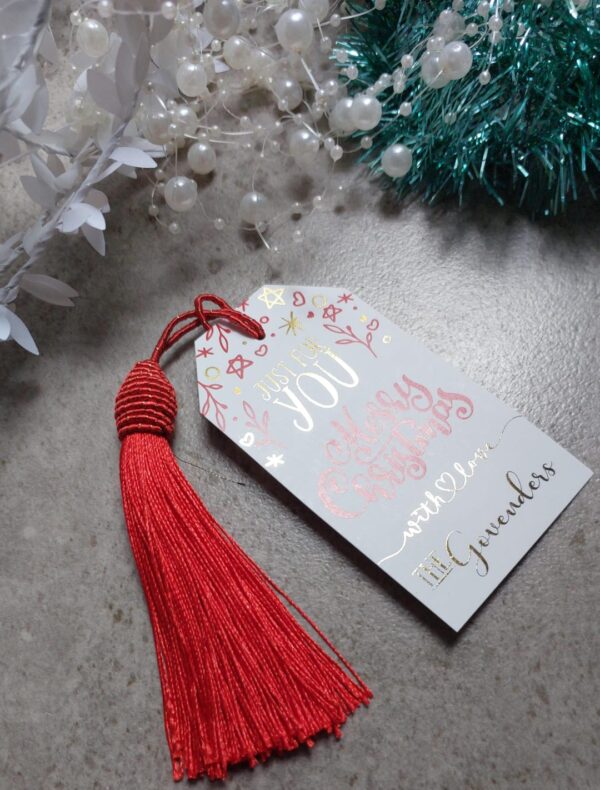 Christmas tassels in red, gold and black